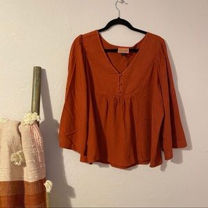 Burnt orange blouse